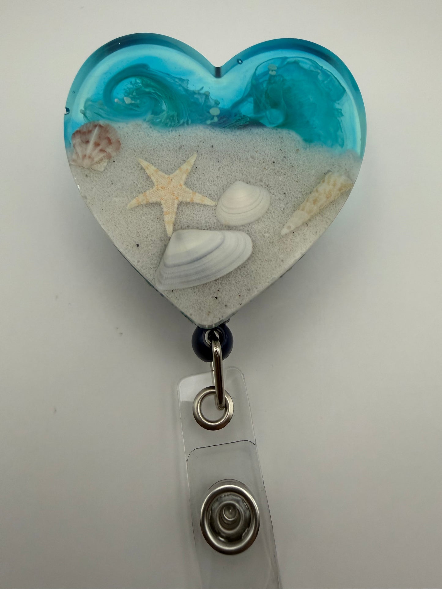Heart-shaped Beach Scene Badge Reel