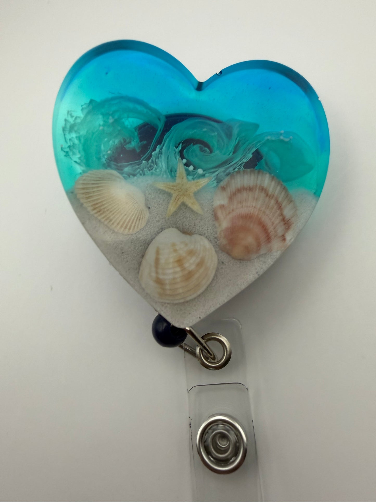 Heart-shaped Beach Scene Badge Reel